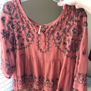 Free People Rust colored blouse with embroidery